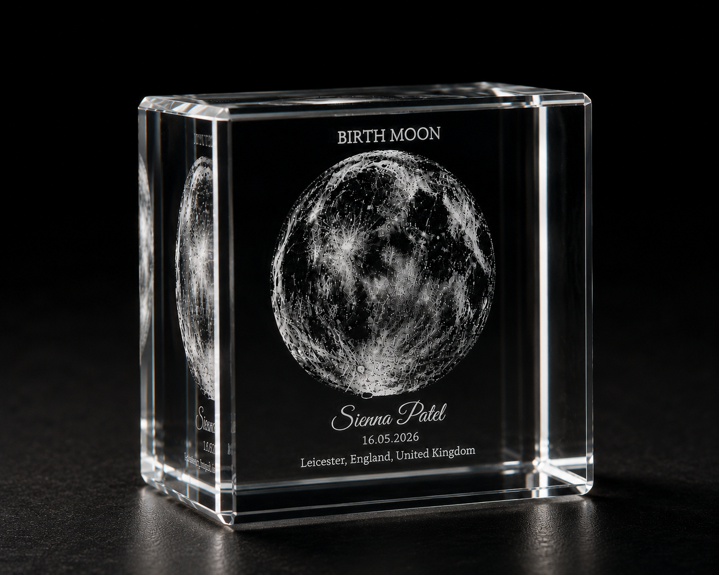 Personalised moon phase crystal cube angled view showing crystal depth and engraving