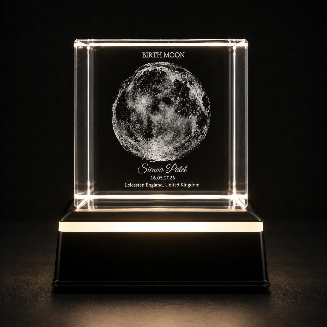 Personalised moon phase crystal cube displayed on LED light base